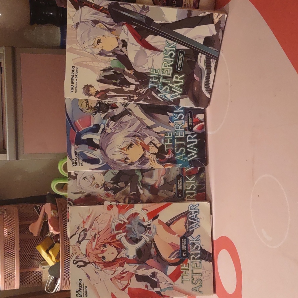 The Asterisk War Manga 1, 6, 10 And 15.